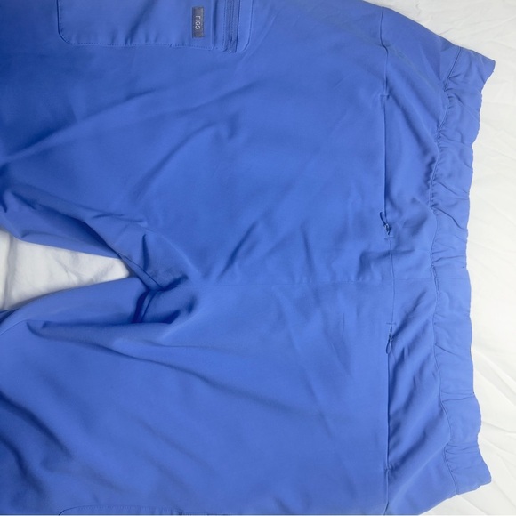 FIGS Lima Jogger Scrub Pants in CEIL BLUE
Used once. - Picture 7 of 10